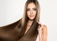 Young attractive model with long, straight,brown hair.