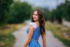 Young attractive smiling woman with long curly hair in retro sty royalty free stock photos Young attractive smiling woman with long curly hair in retro sty royalty free stock photos