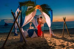 Young beautiful couple have a romantic dinner at sunset royalty free stock images Young beautiful couple have a romantic dinner at sunset royalty free stock images