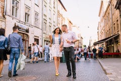 Young beautiful couple smiling, walking in park. stock photography Young beautiful couple smiling, walking in park. stock photography