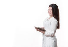 Young beautiful female doctor holding clipboard royalty free stock images Young beautiful female doctor holding clipboard royalty free stock images