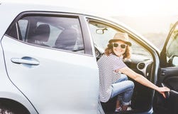 Young beautiful female travel girl in hat and sunglasses speaks royalty free stock photos Young beautiful female travel girl in hat and sunglasses speaks royalty free stock photos