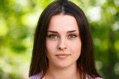 Young beautiful freckled green-eyed woman face portrait with hea stock image Young beautiful freckled green-eyed woman face portrait with hea stock image