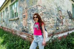 Young beautiful girl at the corner of old building in Ukraine Stock Photography Young beautiful girl at the corner of old building in Ukraine Stock Photography