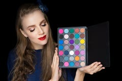 Young beautiful girl holding palette stock photography Young beautiful girl holding palette stock photography