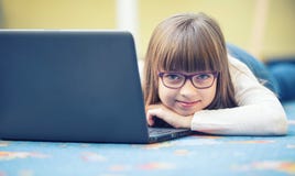 Young of beautiful pre-teen girl with tablet laptop pc. Education technology for teenagers - adolescents children Royalty Free Stock Photo Young of beautiful pre-teen girl with tablet laptop pc. Education technology for teenagers - adolescents children Royalty Free Stock Photo