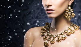 https://thumbs.dreamstime.com/t/young-beautiful-rich-woman-jewels-platinum-stones-over-winter-christmas-background-60832054.jpg