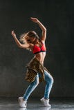 Young beautiful female dancer is posing in the studio stock photos Young beautiful female dancer is posing in the studio stock photos