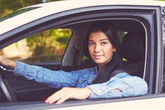 Young beautiful woman driving her car royalty free stock image Young beautiful woman driving her car royalty free stock image