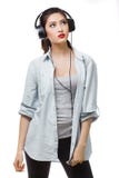 Young beautiful woman enjoy listening to music with big headphones isolated white background Stock Photos Young beautiful woman enjoy listening to music with big headphones isolated white background Stock Photos