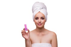 The young beautiful woman with lipstick on white royalty free stock images The young beautiful woman with lipstick on white royalty free stock images