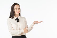 Young Beautiful Woman Points To The Object On The Left / Right. Royalty Free Stock Photography Young Beautiful Woman Points To The Object On The Left / Right. Royalty Free Stock Photography