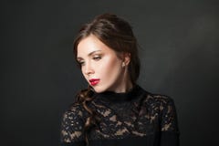Young beautiful woman with red lips makeup hair on black background stock images Young beautiful woman with red lips makeup hair on black background stock images