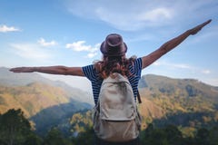 Young beautiful woman traveler enjoys mountain, beautiful landscape and active lifestyle. Sri Lanka - Ceylon Island stock photo Young beautiful woman traveler enjoys mountain, beautiful landscape and active lifestyle. Sri Lanka - Ceylon Island stock photo
