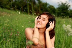 Young Beautiful Woman With Headphones Royalty Free Stock Photos