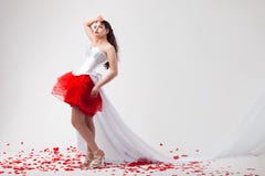 Young Beautiful Woman With Petals Of Roses Royalty Free Stock Image