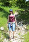 Young beautyful woman in the mountains with blue hat royalty free stock image Young beautyful woman in the mountains with blue hat royalty free stock image