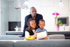 Young Black Family In Fresh Modern Kitchen Royalty Free Stock Image Young Black Family In Fresh Modern Kitchen Royalty Free Stock Image