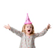Young blond girl in birthday party princess hat hands spread up screaming