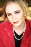 Young Blond Woman In Red Jacket Stock Photography Young Blond Woman In Red Jacket Stock Photography