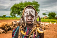 Young Boy From The African Tribe Mursi, Ethiopia Royalty Free Stock Photography Young Boy From The African Tribe Mursi, Ethiopia Royalty Free Stock Photography