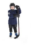 Young boy in ice hockey gear against white royalty free stock photo Young boy in ice hockey gear against white royalty free stock photo