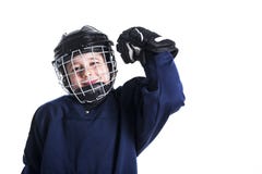 Young boy in ice hockey gear against white royalty free stock photography Young boy in ice hockey gear against white royalty free stock photography