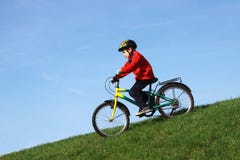 Young Boy On Bike Stock Image