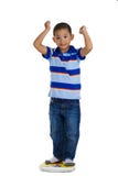 Young Boy On Scale Stock Photo