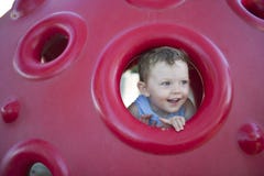 Young boy playing in the playground royalty free stock photo Young boy playing in the playground royalty free stock photo