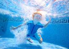 Young Boy Playing Underwater Stock Photo Young Boy Playing Underwater Stock Photo