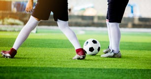 Young Boy Soccer Players Run To Trap And Control The Ball For Shoot To Goal Royalty Free Stock Images