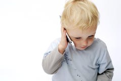 Young Boy Talking On Mobile Phone Royalty Free Stock Photos