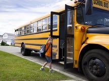 Young boy and yellow school bus Royalty Free Stock Image Young boy and yellow school bus Royalty Free Stock Image