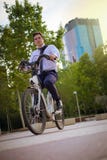 Young buinessman riding to work in the city royalty free stock photography Young buinessman riding to work in the city royalty free stock photography