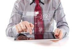 Young business man using a digital pc tablet Royalty Free Stock Photos Young business man using a digital pc tablet Royalty Free Stock Photos