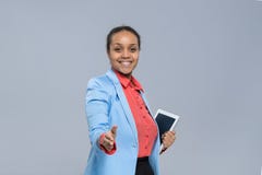 Young Business Woman Hold Tablet Computer African American Girl Handshake Welcome Gesture stock image Young Business Woman Hold Tablet Computer African American Girl Handshake Welcome Gesture stock image