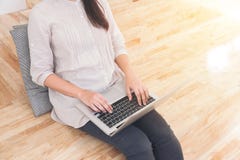 Young business woman sitting in modern office, working on a laptop computer and planning a new start up project stock images Young business woman sitting in modern office, working on a laptop computer and planning a new start up project stock images