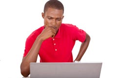 Young businessman working with computer stock photography Young businessman working with computer stock photography