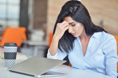 Young busy beautiful latin business woman suffering stress working at office computer royalty free stock images Young busy beautiful latin business woman suffering stress working at office computer royalty free stock images