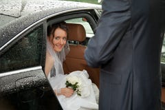 Young Charming Bride Looking Out Of A Car Royalty Free Stock Photo