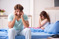 The young couple in the bedroom stock photo The young couple in the bedroom stock photo