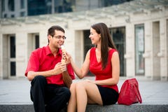 https://thumbs.dreamstime.com/t/young-couple-having-icecream-together-business-people-great-time-street-33409661.jpg