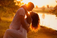 Young Couple In White Dancing On The Background Of Sunset Royalty Free Stock Photography