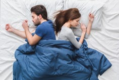 Young couple in bed top view morning concept weekend rest royalty free stock photo Young couple in bed top view morning concept weekend rest royalty free stock photo
