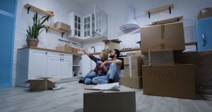 Young couple moving in their new home stock photo Young couple moving in their new home stock photo
