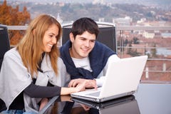 Young Couple Surfing The Internet Stock Photography