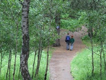 Young couple walking forest