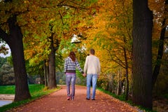 Young Couple Walking In The Garden Stock Photography Young Couple Walking In The Garden Stock Photography