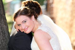 Young couple after wedding in a hug royalty free stock photography Young couple after wedding in a hug royalty free stock photography